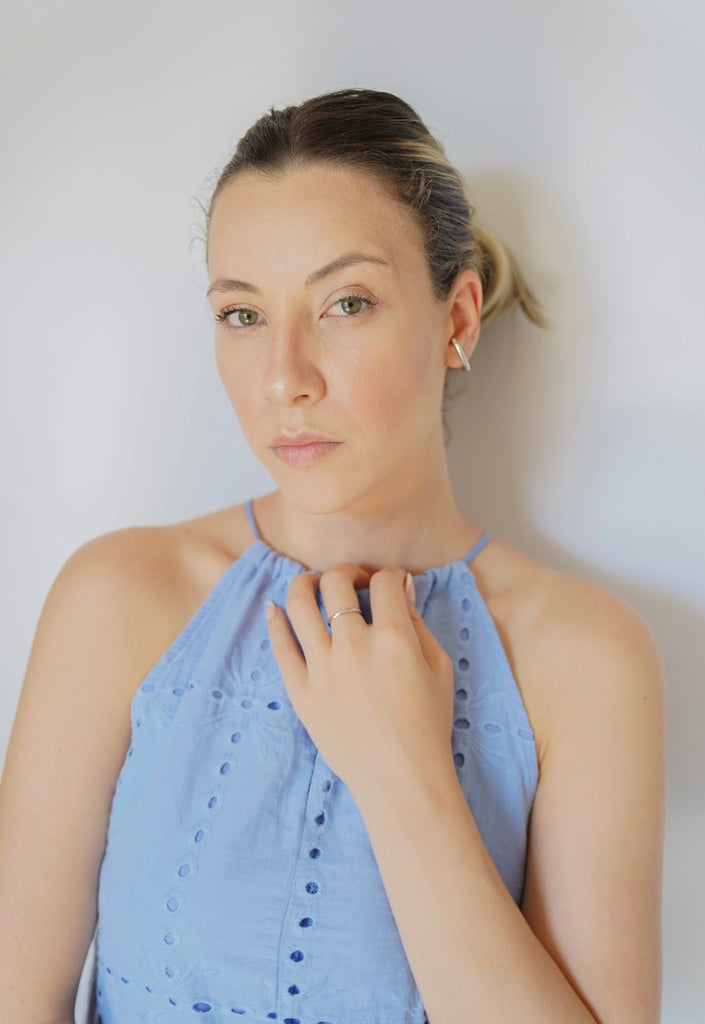 Stainless steel ring with Zirconia     A delicate Steel ring this classic. Style features flush-set cubic zirconia gems.This gorgeous ring is lightweight and easy to style. Beautiful and understated, this steel band ring is perfect to wear alone or stacked with other rings for a statement look.