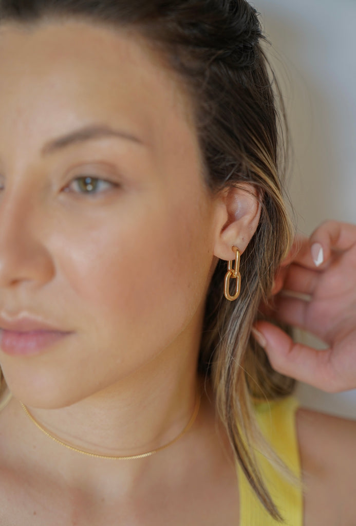  how about buying an earring and you can use it in two ways?yeahh, check out the pic.  These earrings are the perfect size. If you have a lot hair, you can still see them when you  wear hair down. They are lightweight so you never feel like my lobes are being pulled. 