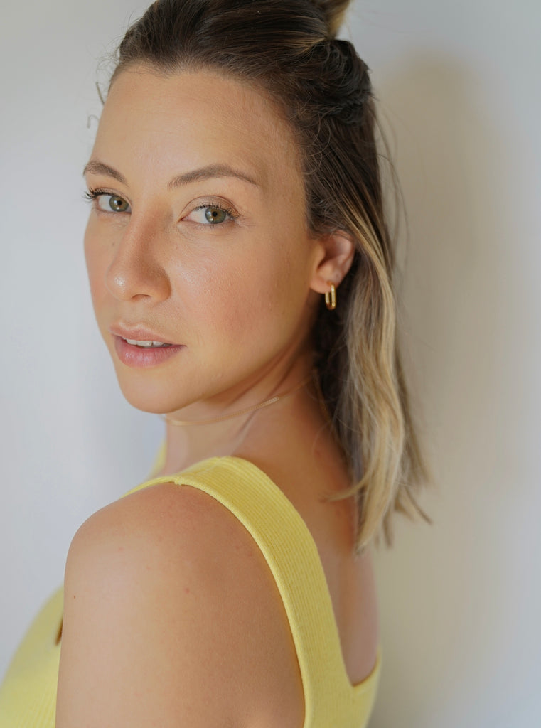  how about buying an earring and you can use it in two ways?yeahh, check out the pic.  These earrings are the perfect size. If you have a lot hair, you can still see them when you  wear hair down. They are lightweight so you never feel like my lobes are being pulled. 